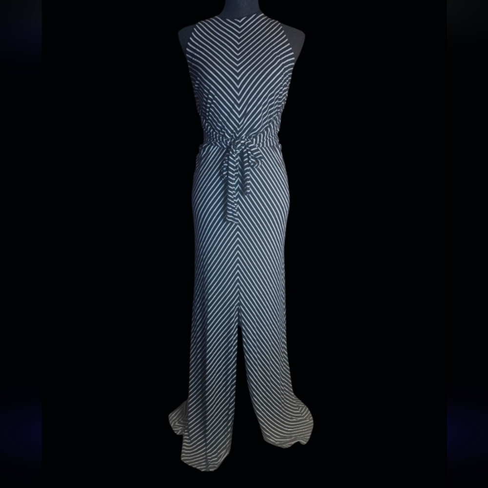 A striking White House Black Market VNeck Striped Maxi Dress in Black/ White S/M